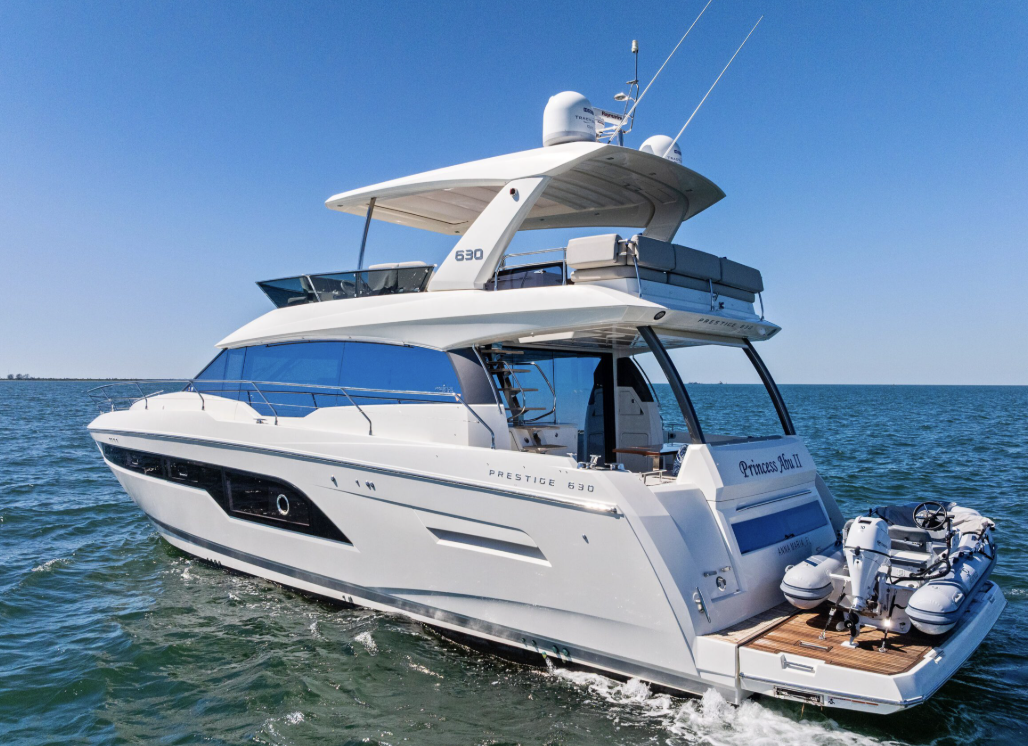 Prestige 630 motor yacht, Princess Abu II, underway on the Gulf