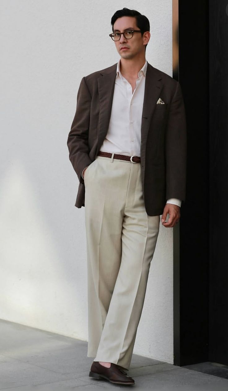 Chocolate blazer with white shirt and ivory trousers