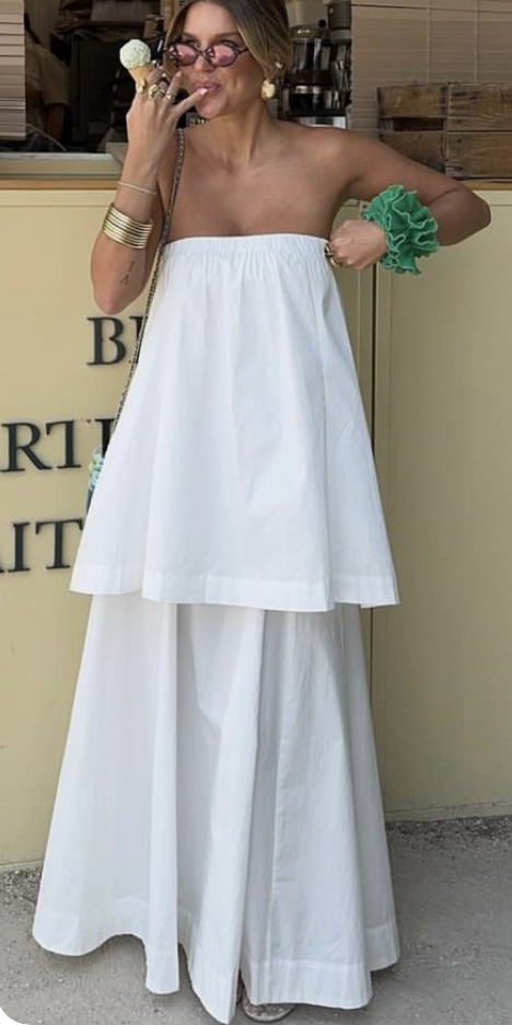 White cotton strapless top with a full white maxi skirt